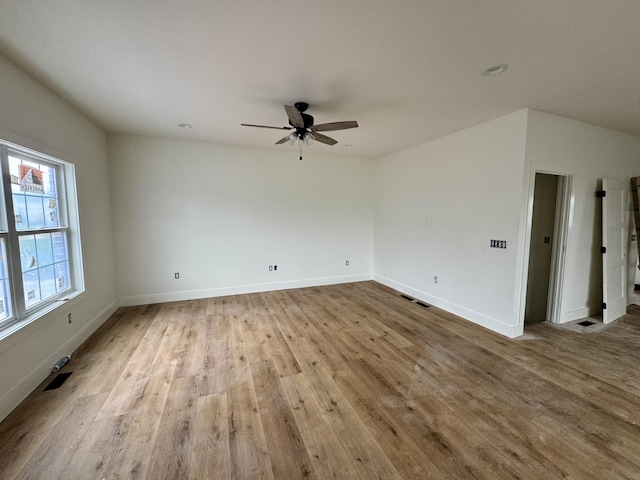 6033 Arbor Woods Way, Richmond, KY 40475 - spare room featuring wood finished floors, a ceiling fan, and baseboards