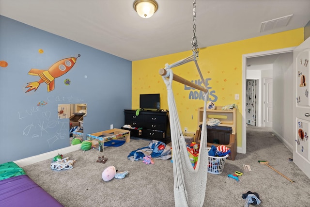 recreation room featuring carpet flooring