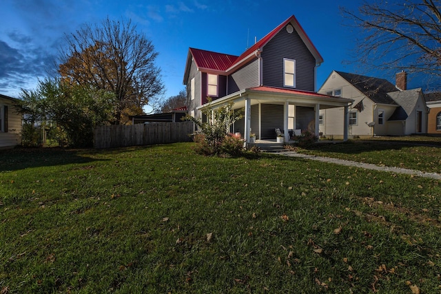 view of front of home featuring a porch and a front yard