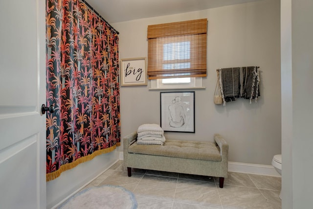 living area with light tile patterned floors