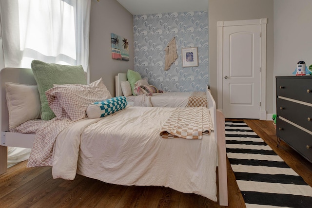 bedroom featuring dark wood-type flooring