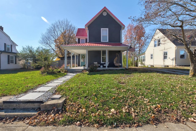 view of front facade with a porch and a front yard