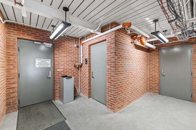 interior space with brick wall