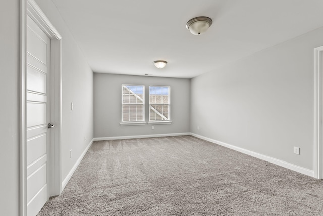 empty room with carpet flooring