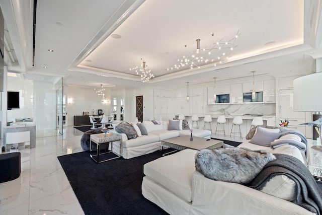 103 S Limestone St Unit 1020, Lexington, KY 40507 - living room featuring a raised ceiling, a chandelier, and light marble finish floors