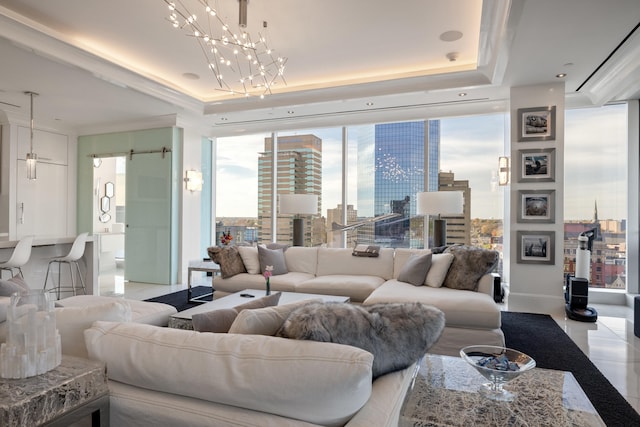 103 S Limestone St Unit 1020, Lexington, KY 40507 - tiled living room featuring a tray ceiling, floor to ceiling windows, a city view, a chandelier, and a barn door
