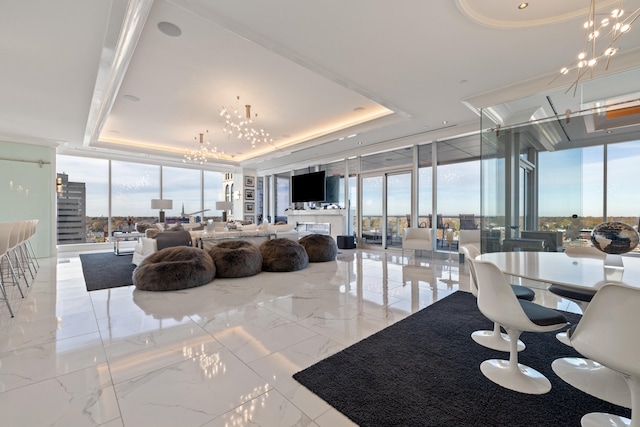 103 S Limestone St Unit 1020, Lexington, KY 40507 - dining room with floor to ceiling windows, a chandelier, a raised ceiling, and plenty of natural light