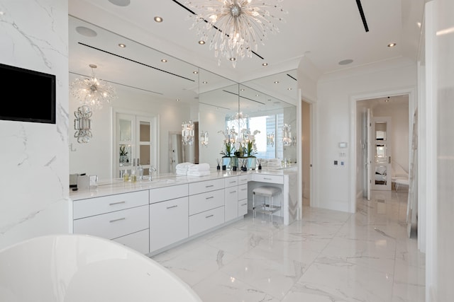 103 S Limestone St Unit 1020, Lexington, KY 40507 - bathroom with a chandelier, a freestanding bath, vanity, and recessed lighting