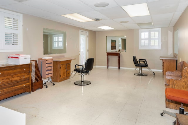 office area featuring a paneled ceiling