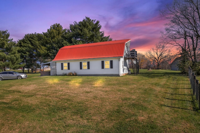 view of front of property with a lawn