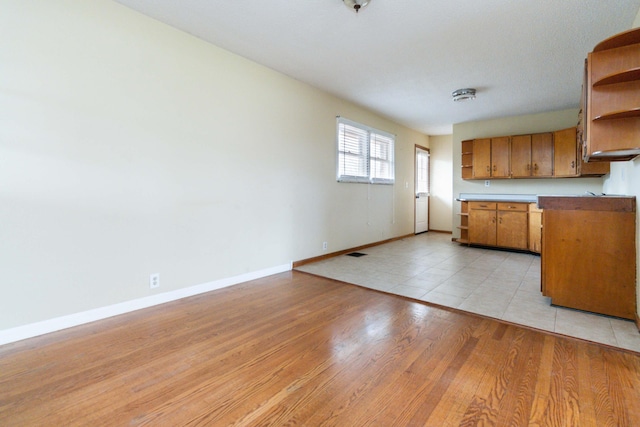 kitchen with light hardwood / wood-style flooring