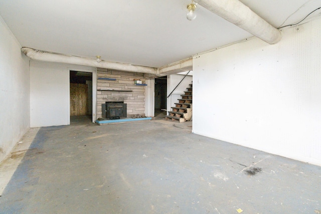 basement featuring a wood stove