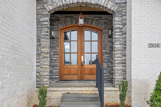 doorway to property featuring french doors