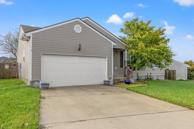 view of front facade with a front yard and a garage