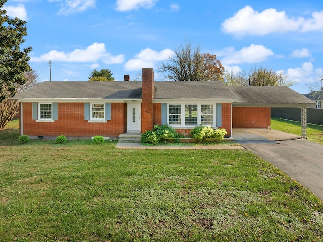 ranch-style house with a front yard and a carport