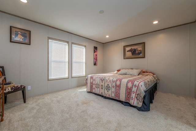 carpeted bedroom featuring ornamental molding