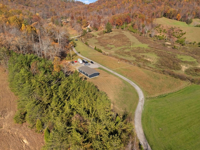 birds eye view of property featuring a rural view