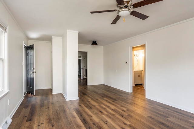 unfurnished room with dark hardwood / wood-style flooring, plenty of natural light, ceiling fan, and crown molding