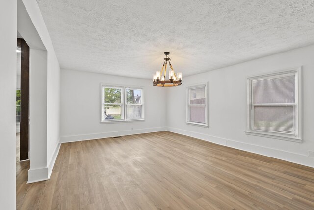 kitchen featuring white cabinets, sink, wood-type flooring, and stainless steel appliances