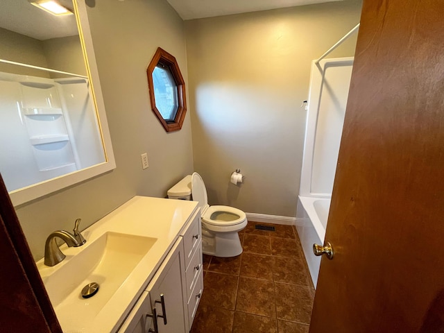 full bathroom with shower / bathing tub combination, tile patterned flooring, vanity, and toilet