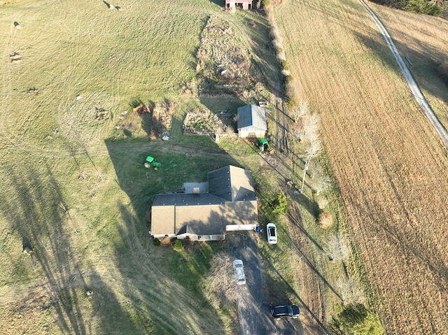 birds eye view of property featuring a rural view