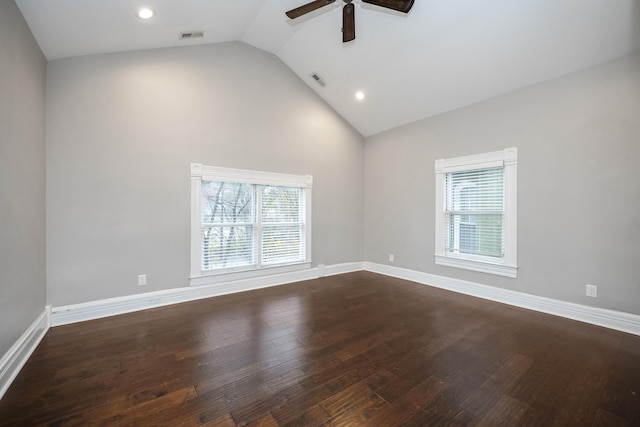 unfurnished room featuring baseboards, dark wood-style floors, visible vents, and ceiling fan