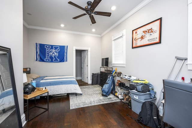 bedroom featuring baseboards, ceiling fan, ornamental molding, recessed lighting, and hardwood / wood-style flooring