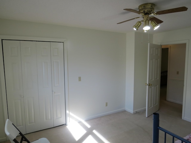 interior space featuring ceiling fan, dark wood-type flooring, and a textured ceiling