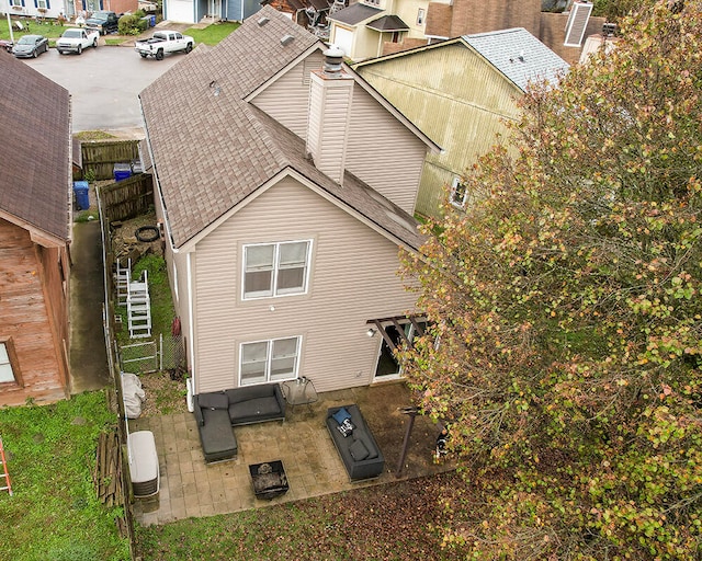 back of house with a patio area