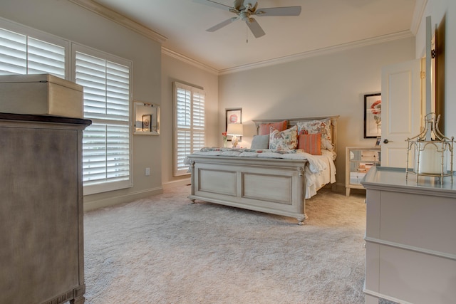 bedroom featuring ceiling fan, light carpet, and ornamental molding