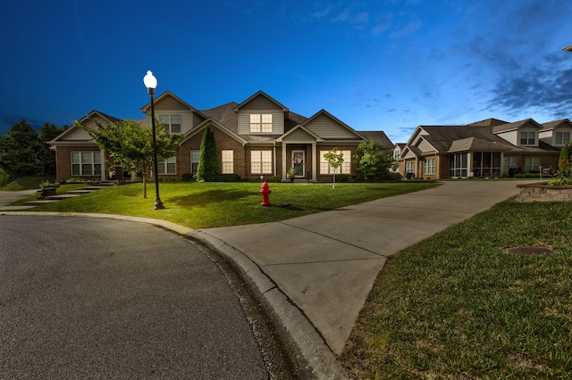 view of front of home featuring a front lawn