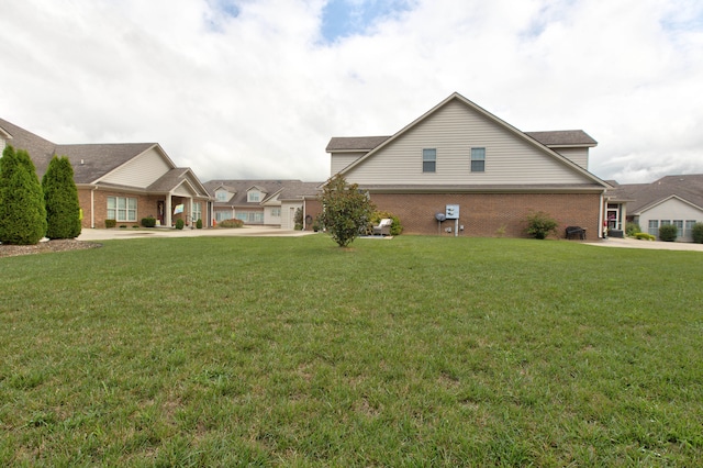 view of home's exterior featuring a lawn