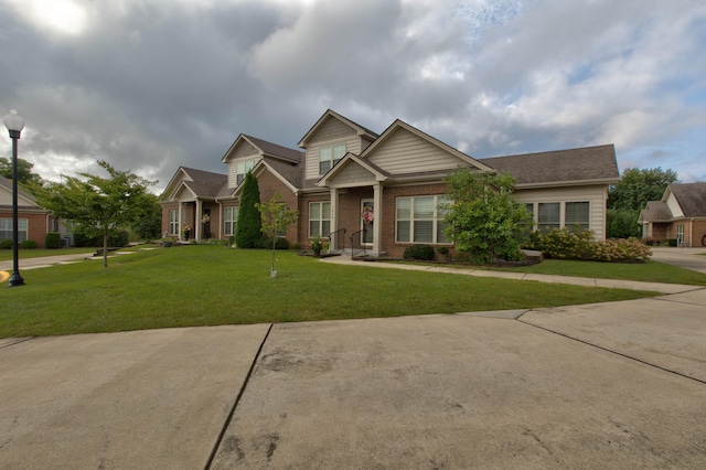 craftsman-style house with a front yard