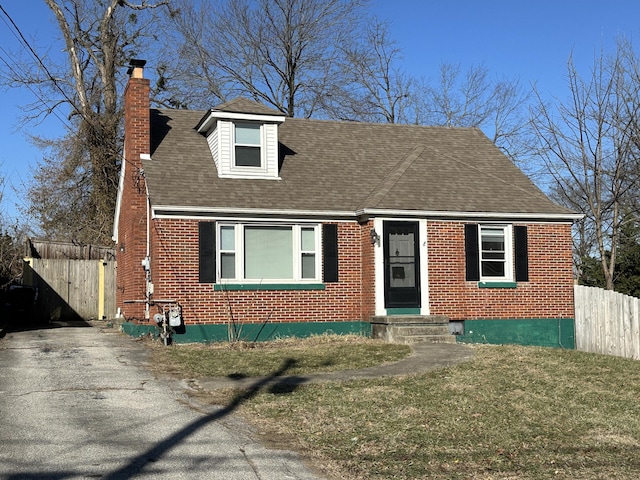 view of front of home with a front lawn