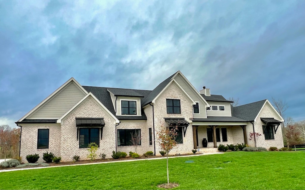 231 The Oaks Blvd, Versailles, KY 40383 - view of front of property featuring a front lawn