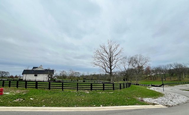 exterior space with a rural view