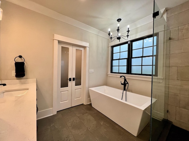 bathroom with plus walk in shower, vanity, and a notable chandelier