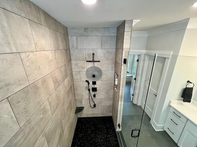 bathroom with vanity and walk in shower