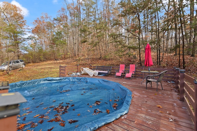 deck with a covered pool