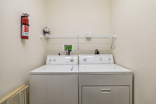 laundry room featuring washing machine and dryer