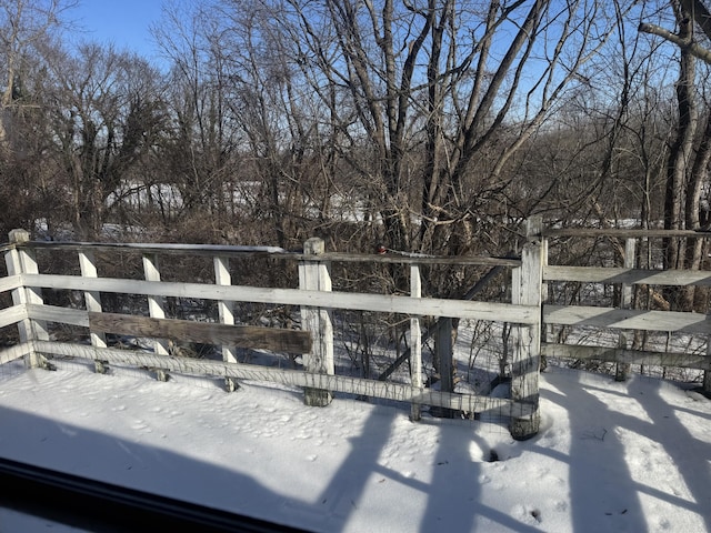 view of snow covered deck