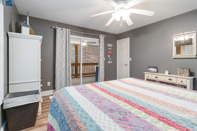 bedroom featuring ceiling fan, access to exterior, and light wood-type flooring