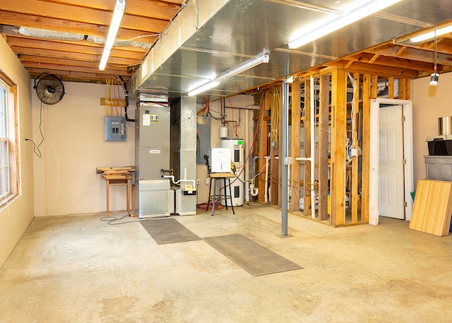 basement with electric panel and water heater