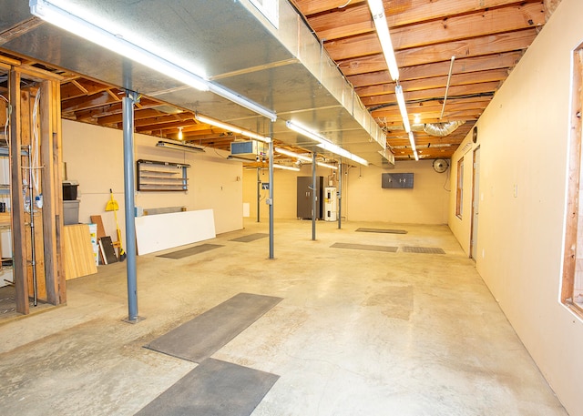 basement featuring water heater