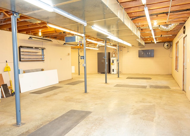 basement featuring electric water heater