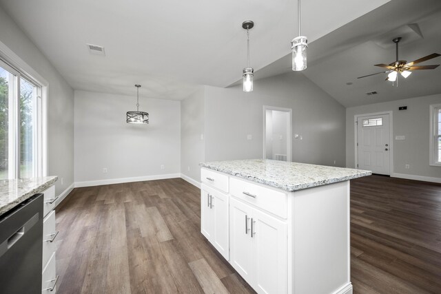 kitchen featuring dark wood-type flooring, dishwasher, pendant lighting, a center island, and white cabinets