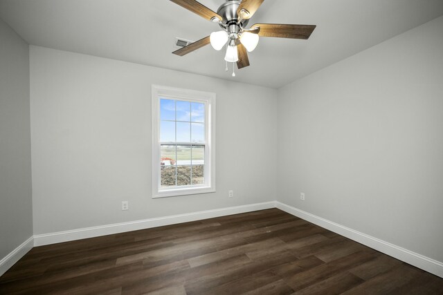 unfurnished bedroom featuring ceiling fan and dark hardwood / wood-style floors