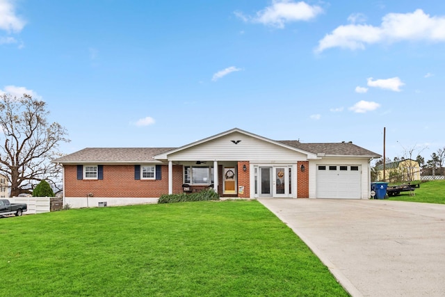 ranch-style house with a garage and a front lawn