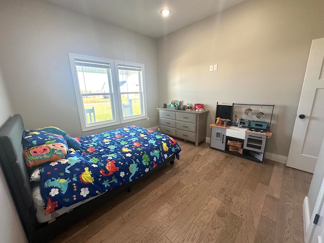 bedroom featuring hardwood / wood-style floors