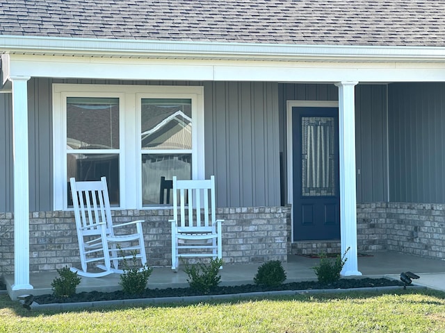 property entrance featuring covered porch